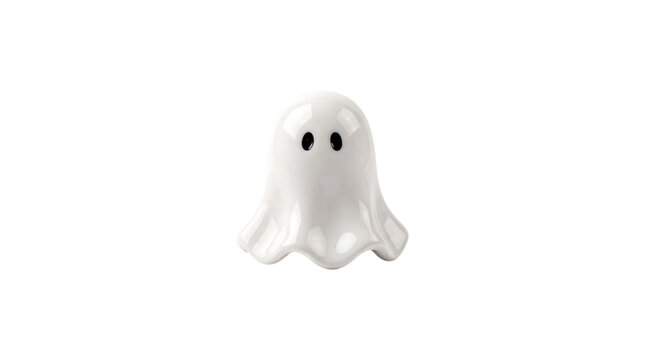A cute small white ceramic ghost figurine isolated on a white background.