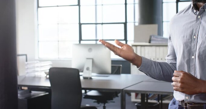 Close up of people talking to the camera, pointing at screen, businessman in office giving presentat