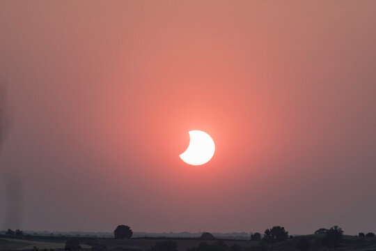 View of the partial solar eclipse, during partiality, in the countryside around San Juan del Monte, Burgos
