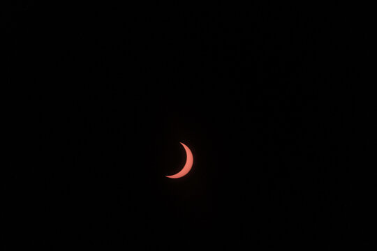 View of the partial solar eclipse, during partiality, in the countryside around San Juan del Monte, Burgos
