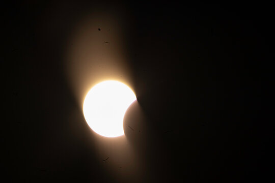 View of the partial solar eclipse, during partiality, in the countryside around San Juan del Monte, Burgos
