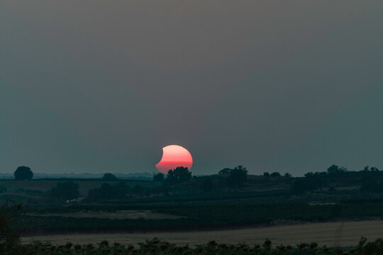 View of the partial solar eclipse, during partiality, in the countryside around San Juan del Monte, Burgos
