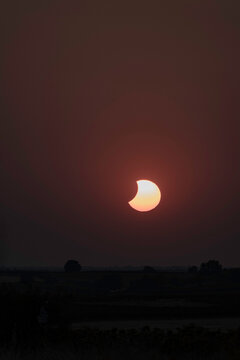 View of the partial solar eclipse, during partiality, in the countryside around San Juan del Monte, Burgos
