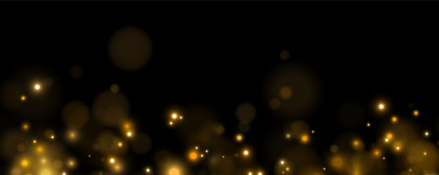Scattered glowing orbs create a magical bokeh effect on a dark background. Warm golden and amber hues vary in size and intensity across the image. This luminous pattern is perfect for.