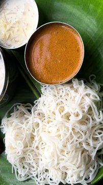 Idiyappam, also known as indiappa, noolappam, noolputtu, sheveo, santhagai, or ottu shavige, is a string hopper dish originating from southern India. It consists of rice flour pressed into noodles.