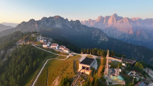 Monte Lussari at dawn, seen from above. A small corner of nature, history and religion preserved in the Julian Alps. A crossroads of religious traditions from the Italian, Austrian and Slovenian.