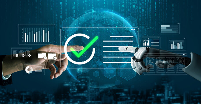 Hands of a human and robotic arm nearing a digital interface with check mark symbolizing technology collaboration and future in automation and innovation. Glyphic.