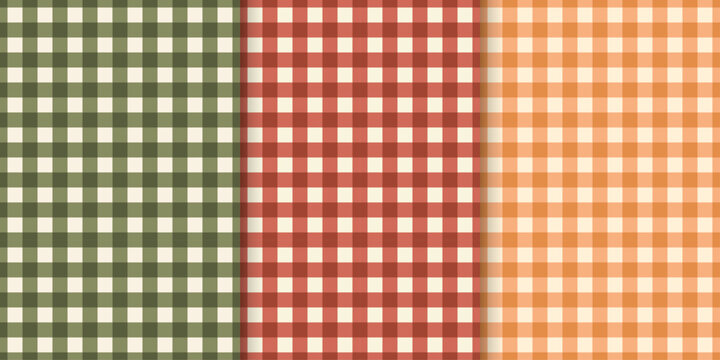 Autumn gingham seamless pattern set. Warm orange, red and green plaid check backgrounds. Print for tablecloth textile, picnic blanket and napkin. Vintage vichy checkered pattern. Vector illustration