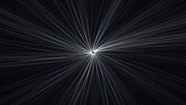 Abstract light trails radiating from a central point in dark space