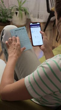 Woman Ordering Prescription Medication Through Mobile Pharmacy App at Home
