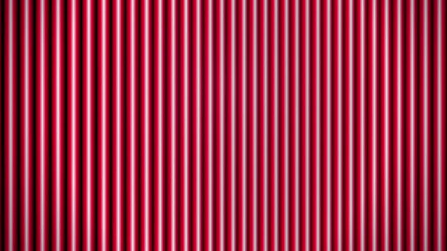 Abstract background with vertical red and white stripes creating a repeating pattern of light and shadow for modern graphic design and texture