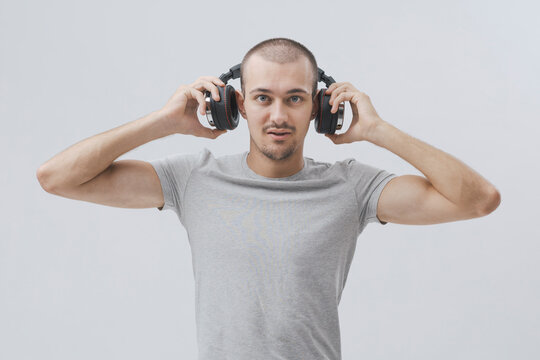 Smiling Man Wearing Headphones