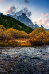 Rocky Mountain Peak over River Flowing Surrounded by Larch Forest in Claree Valley French Alps Nevache France © Mumemories