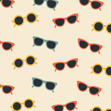 A pattern of sunglasses on a cream background