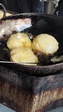 Chole Bhature &ndash; A famous North Indian street food with spicy chickpea curry (Chole) and crispy deep-fried bread (Bhature). Indians favorite, loved in restaurants, homes, and street food stalls.