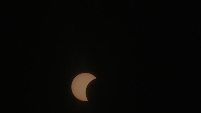 View of the partial solar eclipse, during partiality, in the countryside around San Juan del Monte, Burgos 