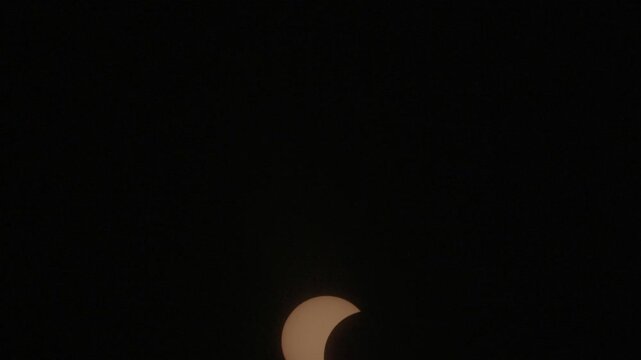 View of the partial solar eclipse, during partiality, in the countryside around San Juan del Monte, Burgos 