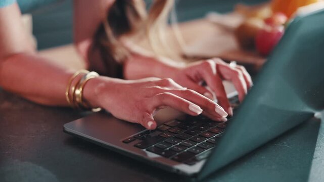Hands, typing and freelancer with laptop in house, copywriting and planning for article on website. Remote work, copywriter and person with technology, email marketing and editing blog post in home