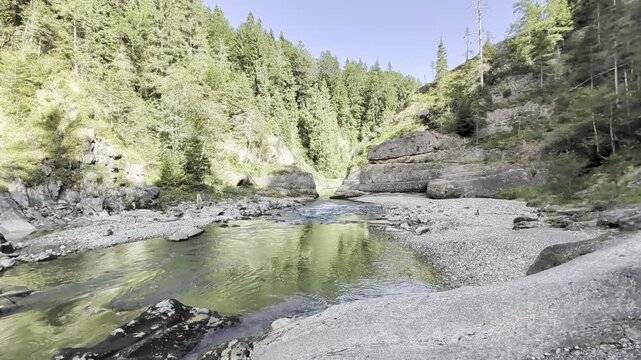 Ammer River flows through  the rocky Scheibum gorge (Ammerdurchbruch) surrounded by forest ideal for nature travel