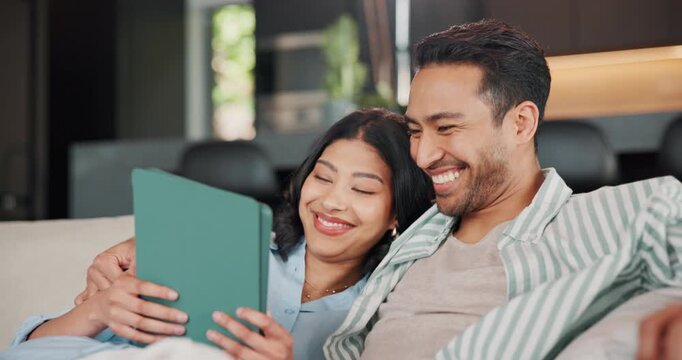 Relax, talking and couple on sofa with tablet, internet and website for streaming option on weekend. Happy, home and man with woman on tech for connection, bonding and conversation with subscription