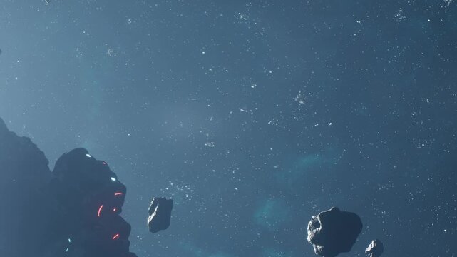 Asteroids drift in outer space under a starry sky. The scene shows different shapes and sizes of asteroids against the dark backdrop of space.