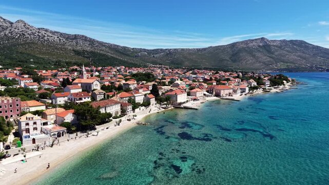 Aerial View of Historic Mediterranean Town on Crystal Clear Adriatic Coast