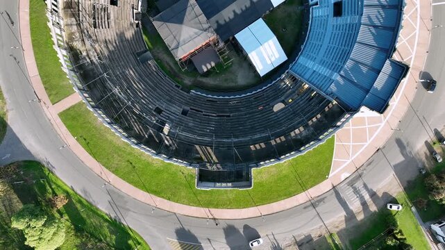 Top-down aerial over Plaza de Toros Real de San Carlos, the circular bullring arena in Colonia del Sacramento, Uruguay