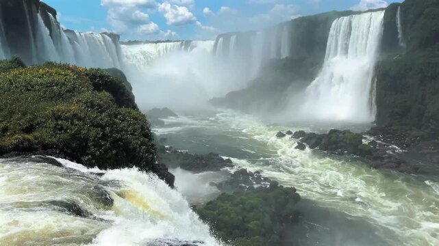 Iguazu Falls on the Argentina-Brazil border, one of the world&rsquo;s largest waterfall systems with 275 cascades surrounded by lush subtropical rainforest in Iguazu National Park.