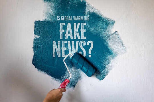 IS GLOBAL WARMING FAKE NEWS? Question Painted on a Textured Wall