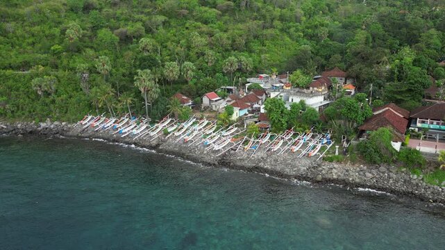 Idyllic Lipah Beach Scene Houses Boats And Ocean Amed Bali Indonesia Drone Static 4K 60FPS
