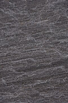 Gray stone background texture. Vertical image. 