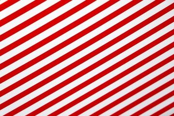 Obraz premium Représentation de bandes rouges et blanches parallèles et disposées en diagonal. Motifs répétitifs de lignes espacées régulièrement.