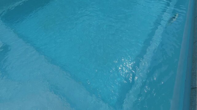 Crystal Clear Blue Swimming Pool Water Ripples Background Texture