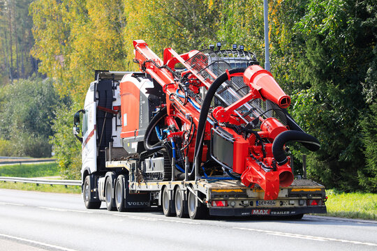 Volvo FH 500 truck transports Sandvik Leopard DI450 Down The Hole Drill Rig
on the road, rear view. 