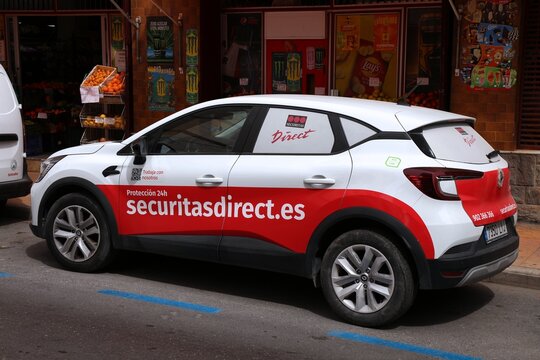 BENIDORM, SPAIN - APRIL 11, 2025: Renault Captur patrol car of Securitas Direct security company in Benidorm, Spain.