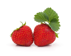 Two red ripe strawberries with green leaf isolated on a white background. © voren1