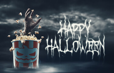 Naklejka premium Happy Halloween wishes and zombie hand in a popcorn bucket