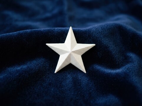 Elegant silver star on luxurious dark blue velvet for stylish interior decor