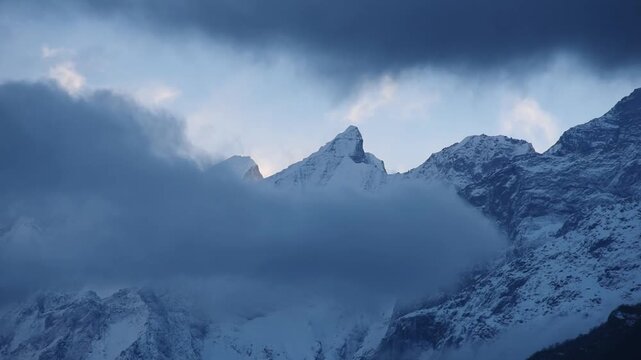 Close view of cloud streaming over the summits of the Annapurna and Machapuchare range, Annapurna region, Nepal