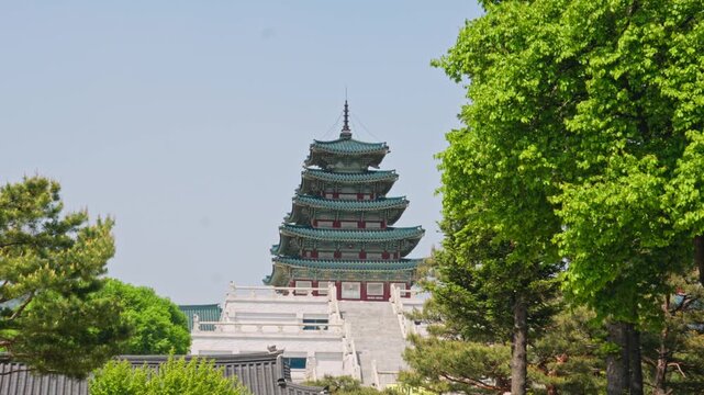 Gyeongbokgung Palace is the primary royal palace of the Joseon Dynasty, built in 1395 in central Seoul, celebrated for its monumental gates, traditional wooden architecture, and grand courtyards.