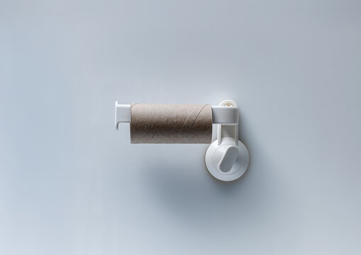 Minimalist Empty Toilet Paper Roll on Wall Holder