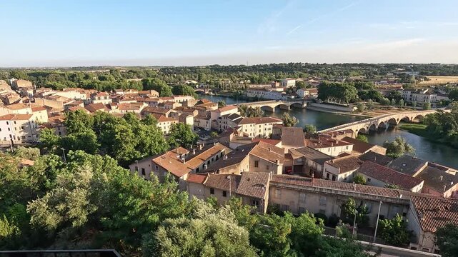 Panorama - Le Balcons - Cathedrale Saint-Nazaire Rooftops of Beziers old town, the Orb river and the arched Pont Vieux, Herault, Occitanie, France