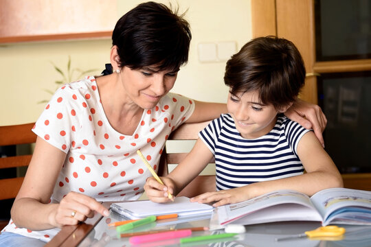 Family bonding during homework time in cozy kitchen with colorful supplies and attentive guidance