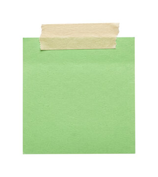 Green square paper note attached with beige masking tape perfect for office reminders