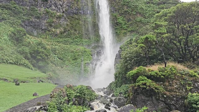 Poco do Bacalhau plunges into its green ravine, Faja Grande, Flores, Azores, Portugal