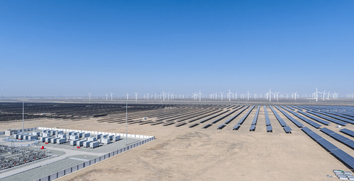 Aerial View of Integrated Renewable Energy Base with Solar, Wind, and Storage on Desert