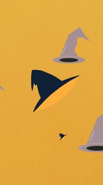 Animation of falling witchs hats on orange background