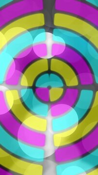 Animation of colorful concentric circles and bokeh lights forming vibrant pattern
