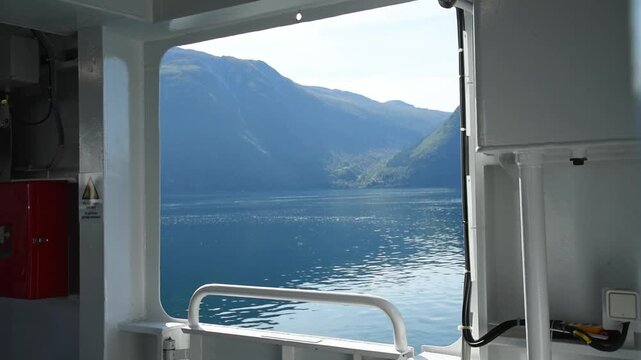 Fjord and mountainside framed by a ferry deck opening, Sognefjord, Vestland, Norway