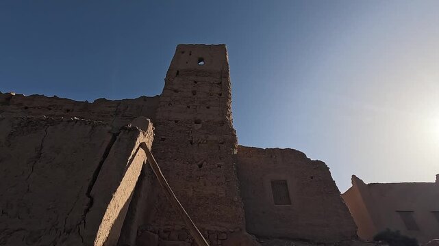 Crumbling mud-brick tower of an old kasbah, Ziz Canyon, Draa-Tafilalet, Morocco